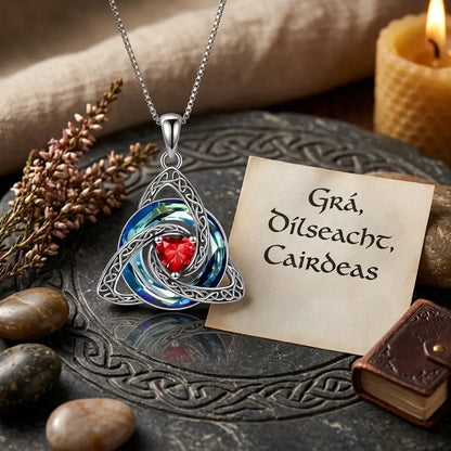 Close-up of the polished Trinity knot pendant detail