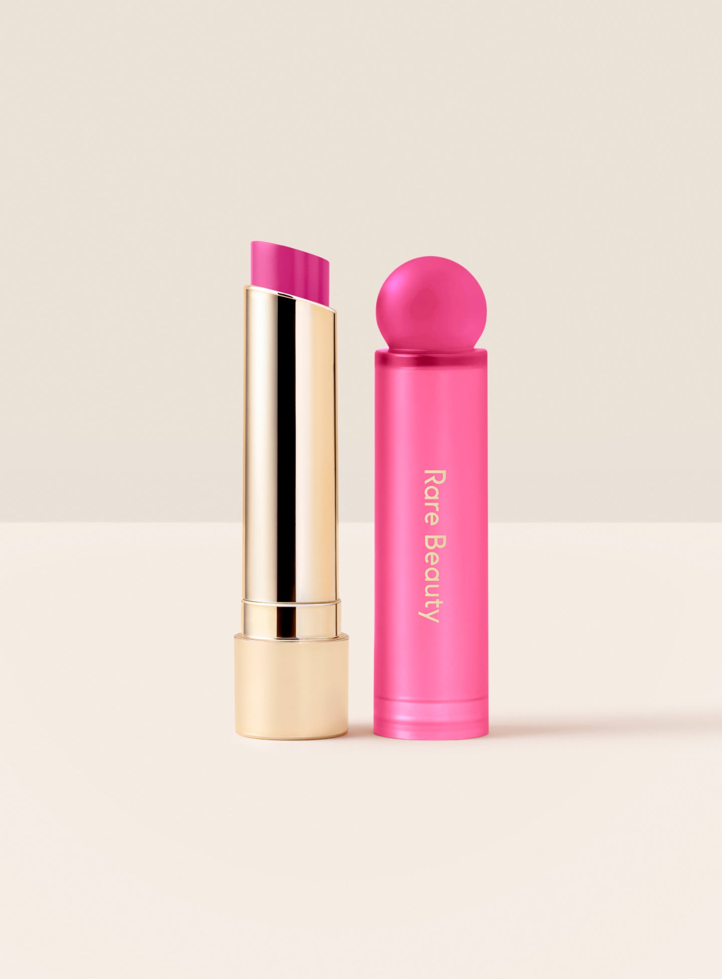 Rare Beauty Soft Pinch Lip Oil Stick in Bloom violet pink