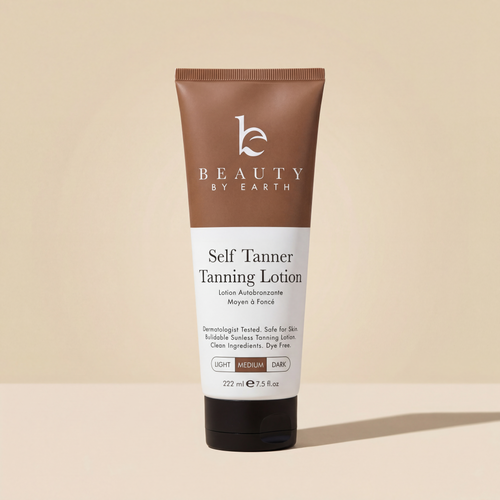 Beauty by Earth Self Tanner Body Lotion in Medium, 7.5 fl oz tube on a beige background